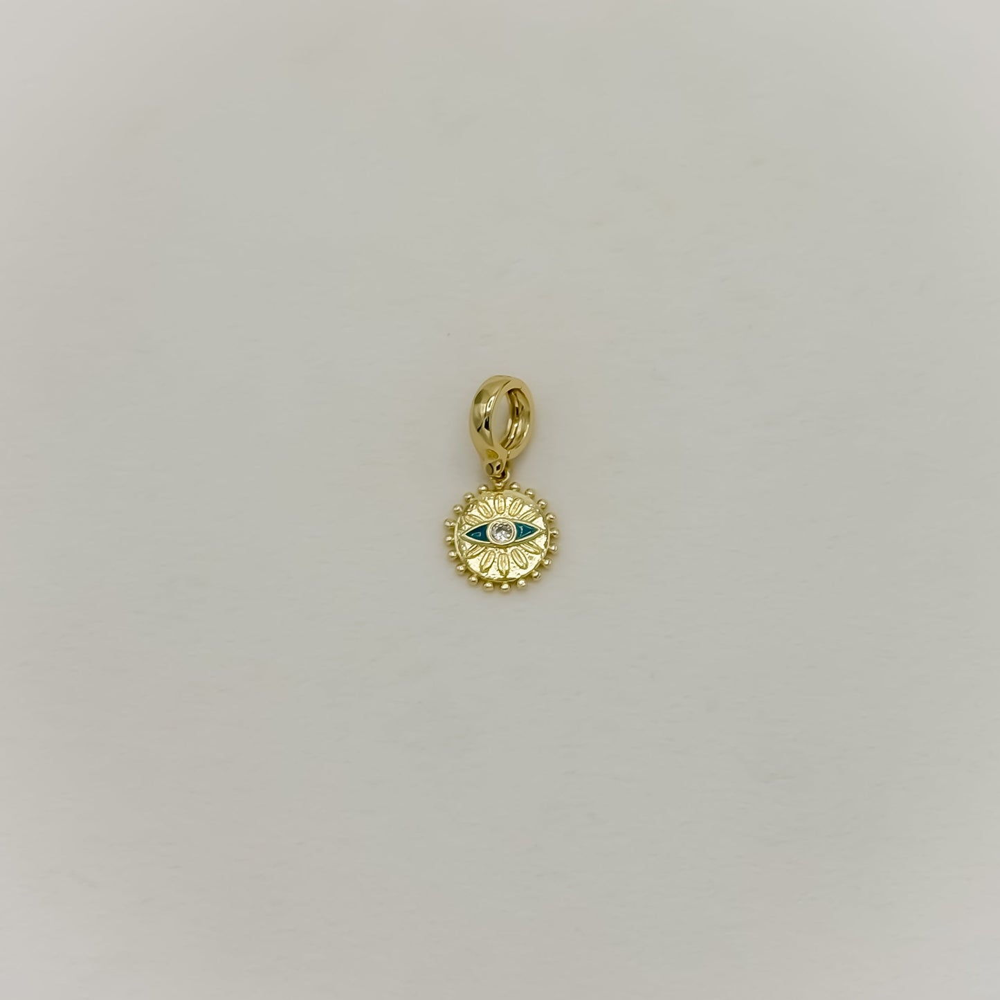 Rounded Turquoise Evil Eye Charm